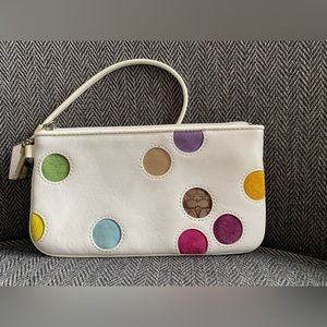 Limited edition Coach white leather polkadot wristlet.